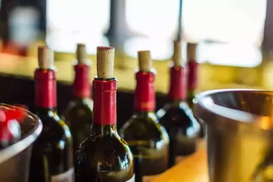 Wine bottles after just being bottled on the line