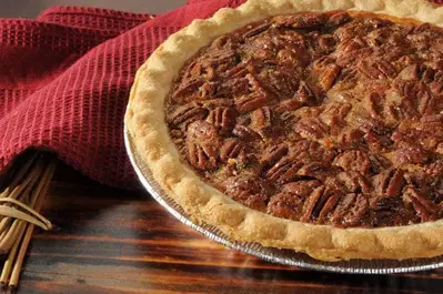 Entire pecan pie with a golden crust
