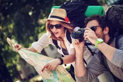 Happy tourists taking pictures during Smoky Mountain vacation