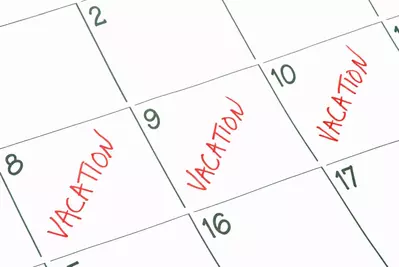 Part of calendar marked "vacation" in red