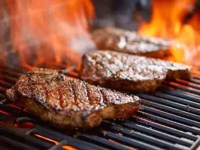 Delicious steaks on the grill.