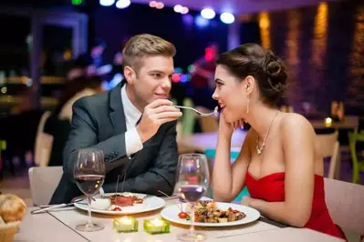 Couple enjoying dinner at one of the top Pigeon Forge restaurants fine dining.