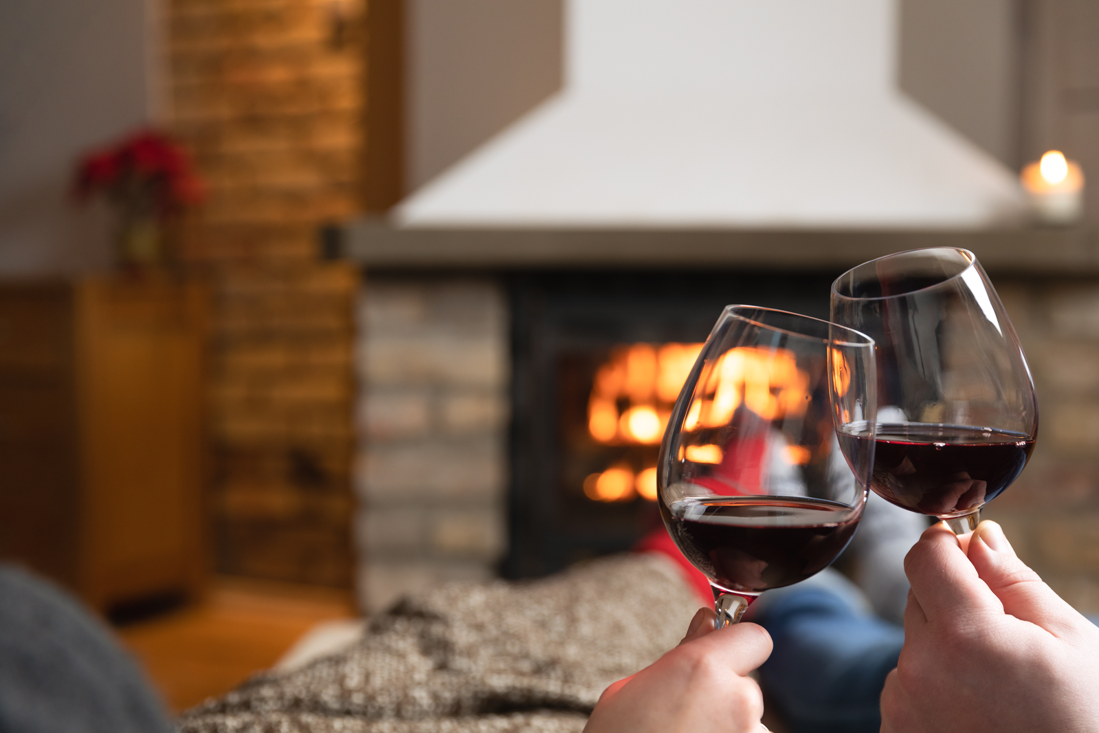 drinking wine by the fireplace