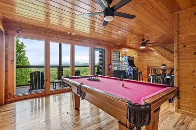 Timber Lodge Sevierville cabin with a pool table and arcade games