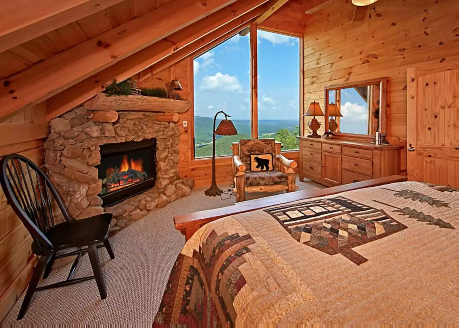 Wake up to beautiful views or enjoy a cozy sitting area by the fire. 