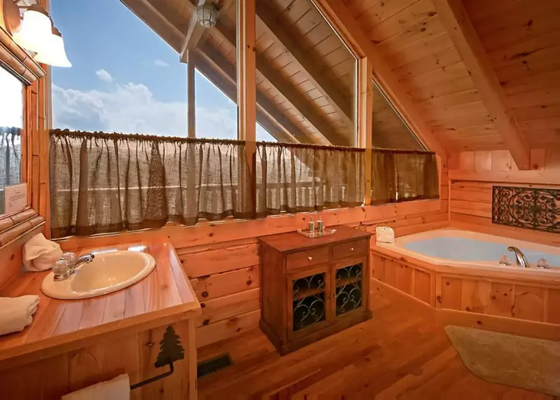  Private en-suite bath with a Jacuzzi tub, walk in shower and beautiful views out the window.