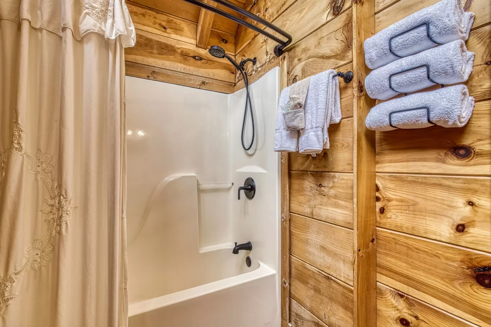 A Walk in the Clouds bathroom with tub/shower combo