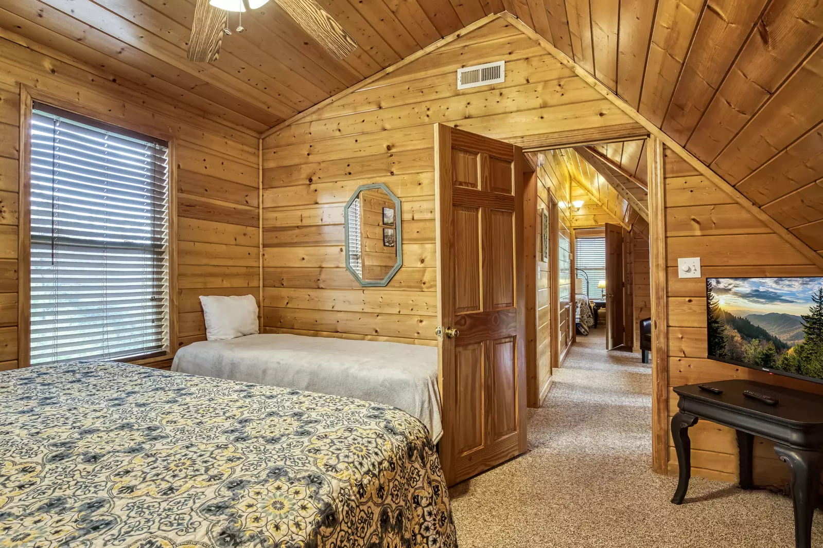 Amazing Grace upper level bedroom with a king size bed