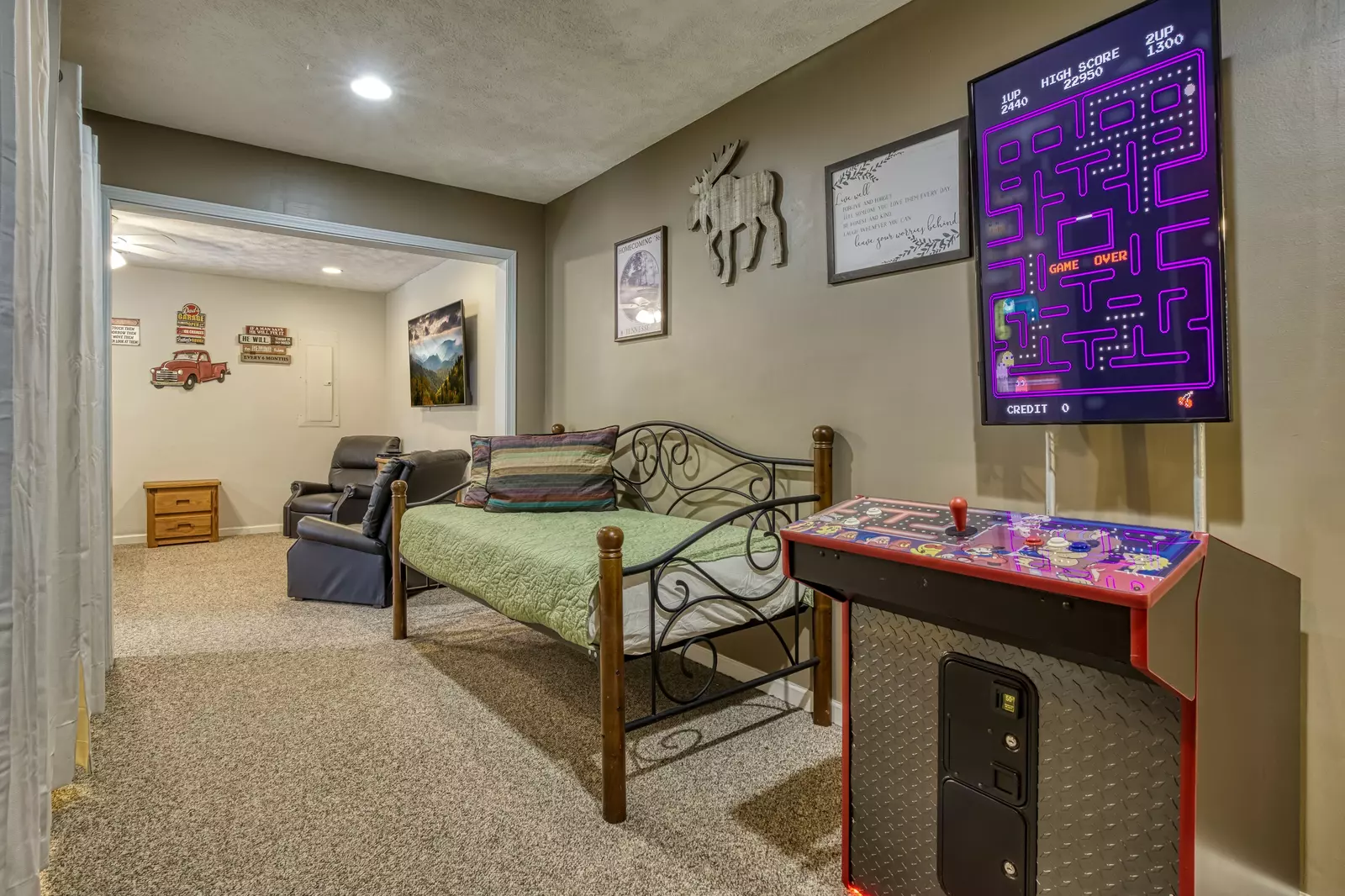 Amazing Grace lower level game area with day bed