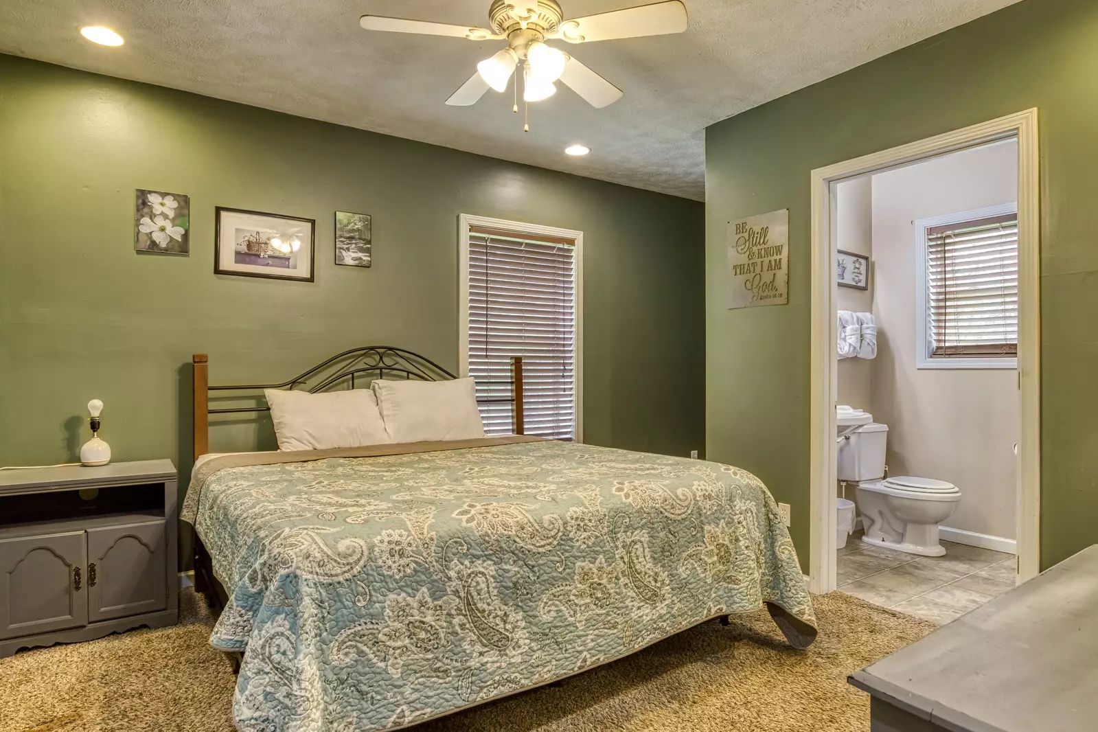 Amazing Grace lower level bedroom with king size bed