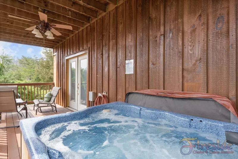 Amazing Grace lower level deck with hot tub