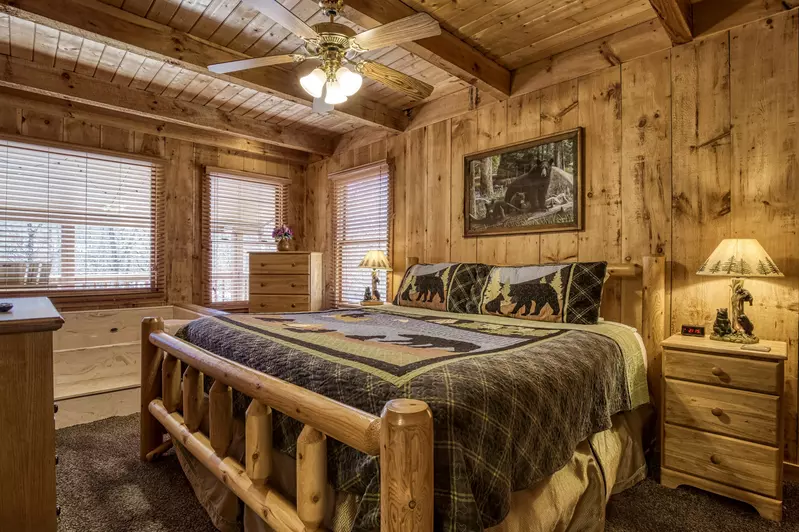 Autumn Colors main level bedroom with king size log bed