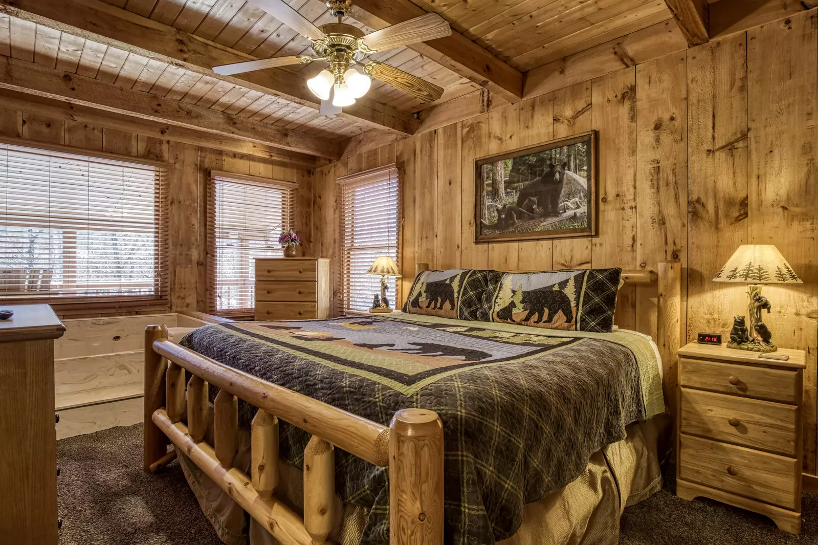 Autumn Colors main level bedroom with king size log bed