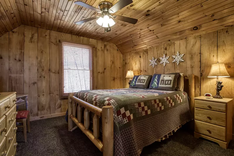 Autumn Colors upper level bedroom with queen size bed