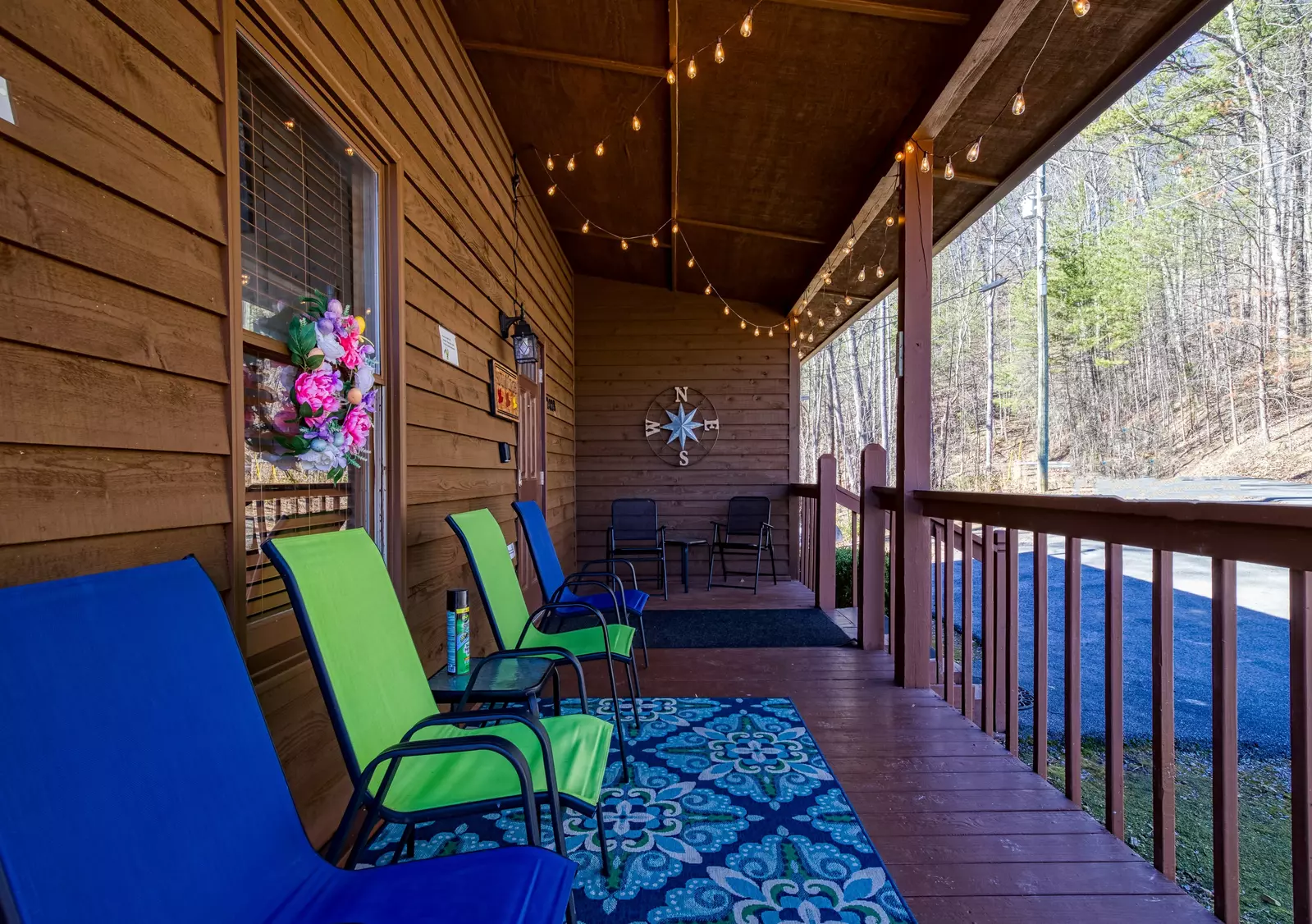 Autumn Colors covered entry deck with chairs