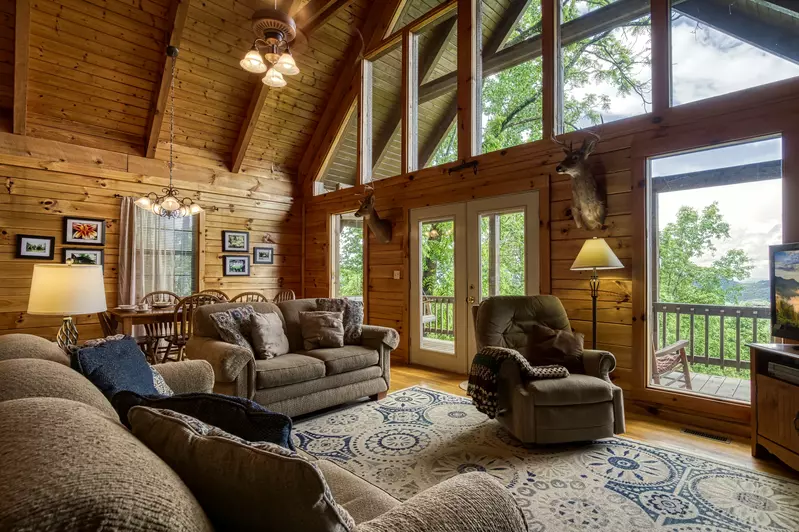 Awesome View living room with floor to ceiling windows