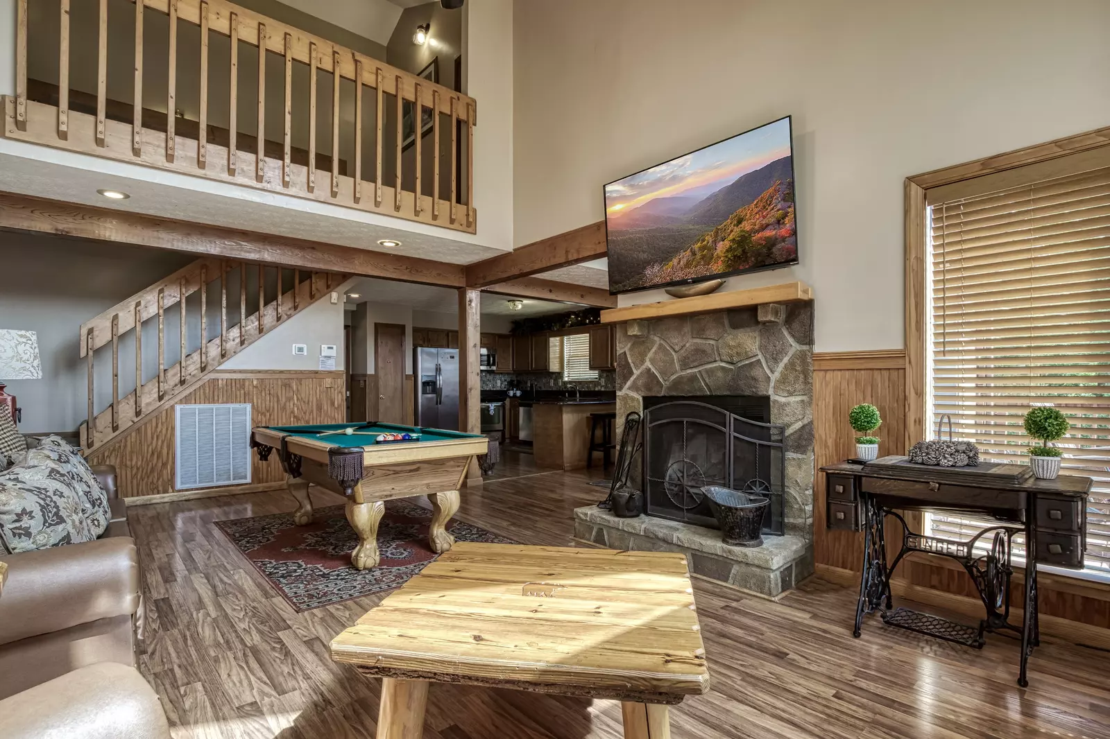 Builtmore Hideaway living room with wood burning fireplace