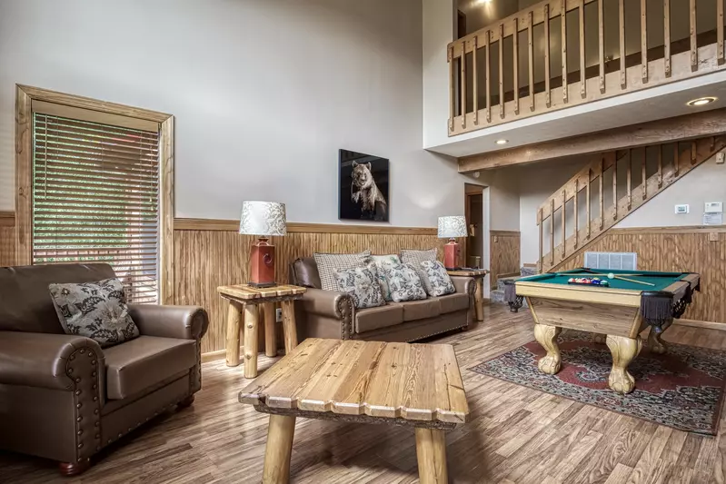 Builtmore Hideaway living room with pool table