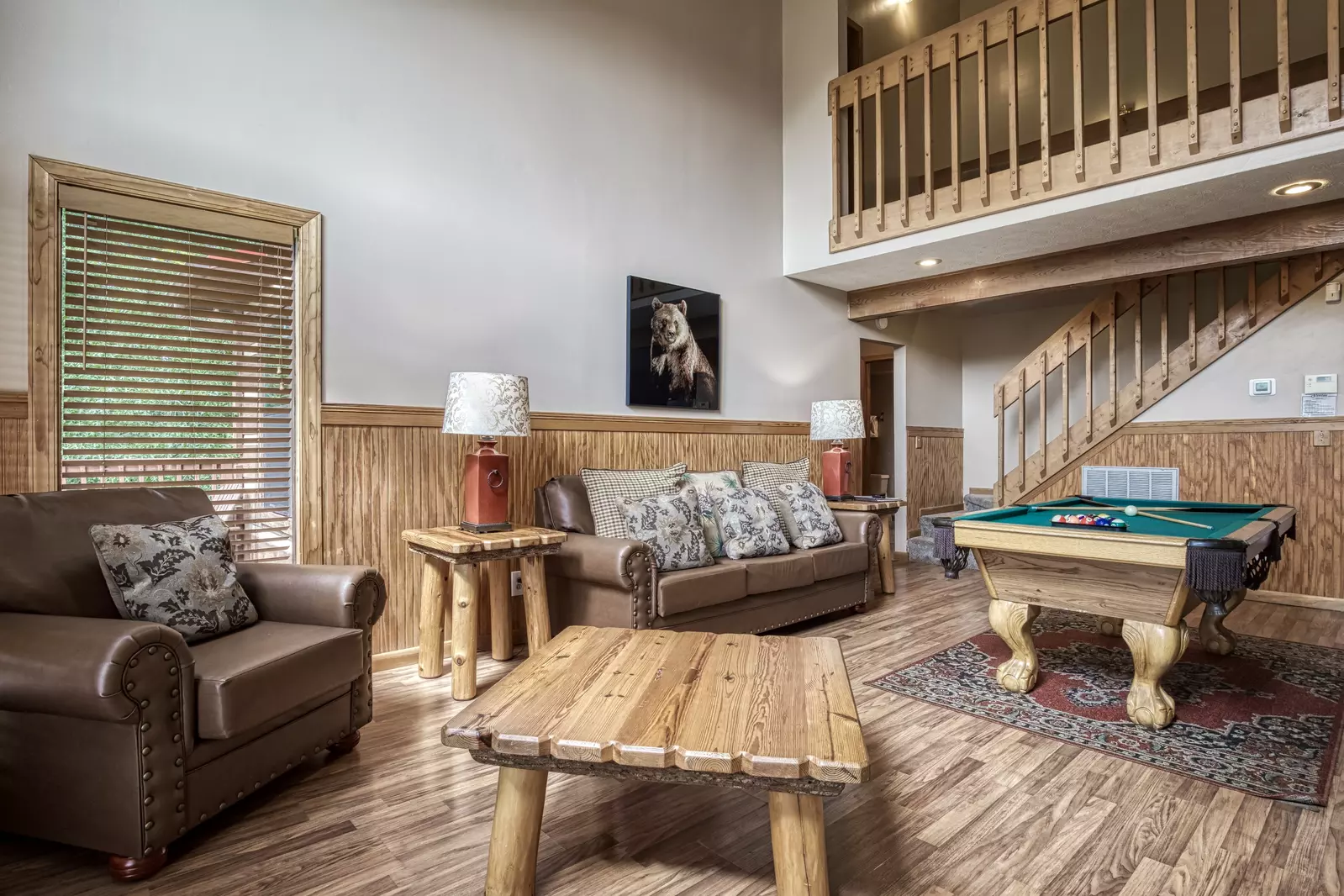 Builtmore Hideaway living room with pool table