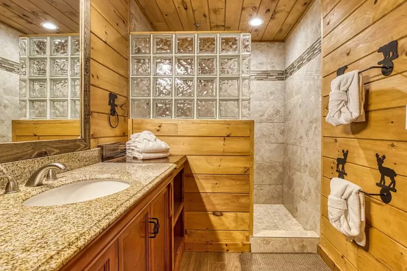 Getaway Mountain Lodge main level bathroom one with walk in shower