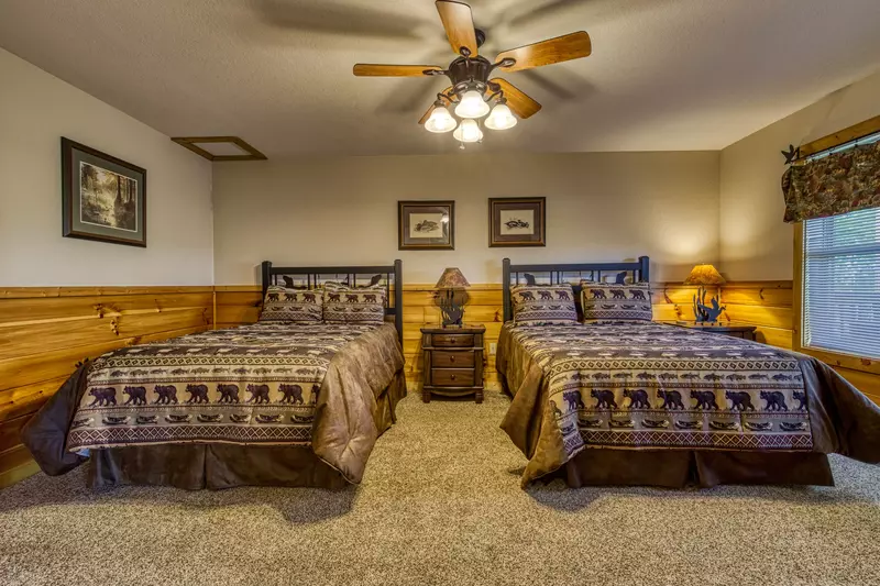 Getaway Mountain Lodge lower level bedroom two with 2 queen size beds