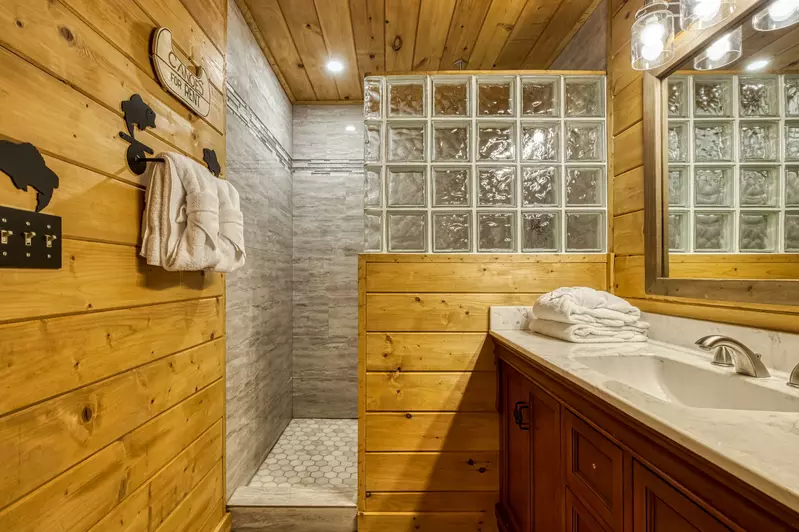 Getaway Mountain Lodge lower level bathroom two with a walk in shower