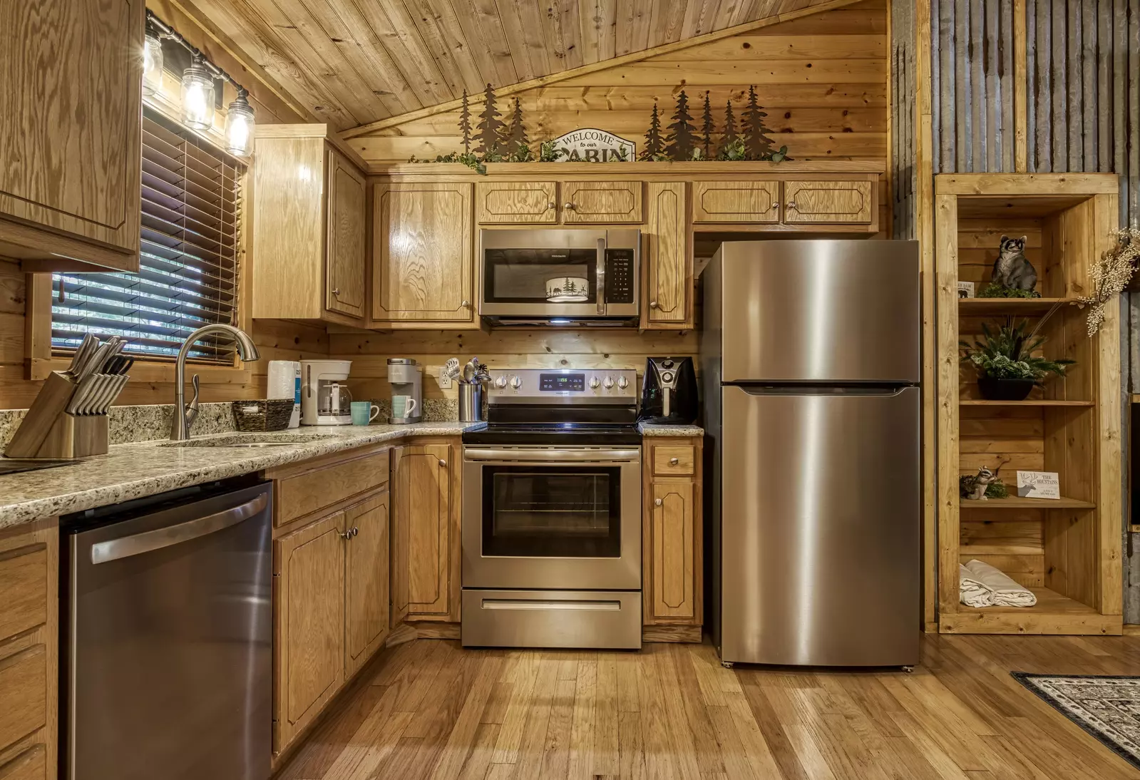 Honeymoon Hideaway fully furnished kitchen with granite countertops
