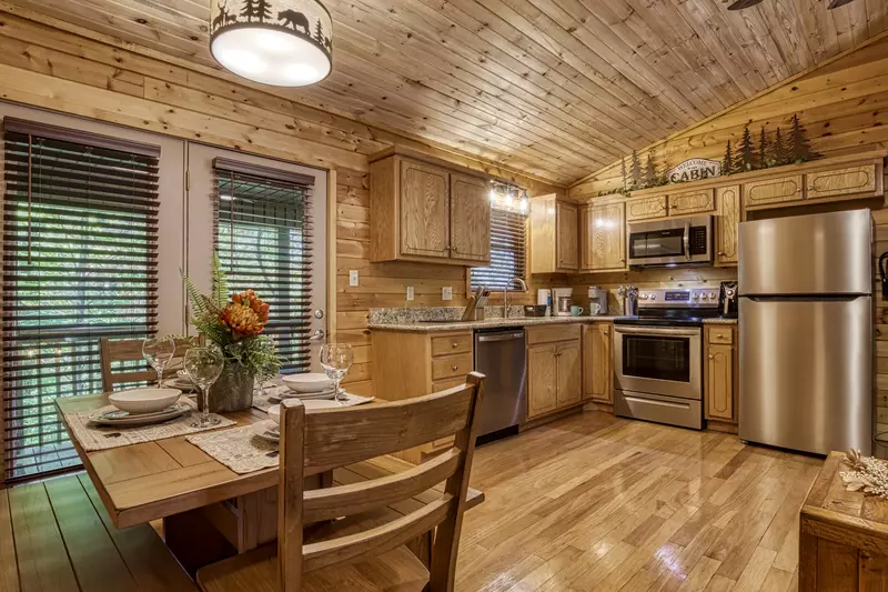 Honeymoon Hideaway dining room and fully furnished kitchen