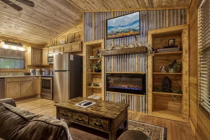 Honeymoon Hideaway living room with year round electric fireplace