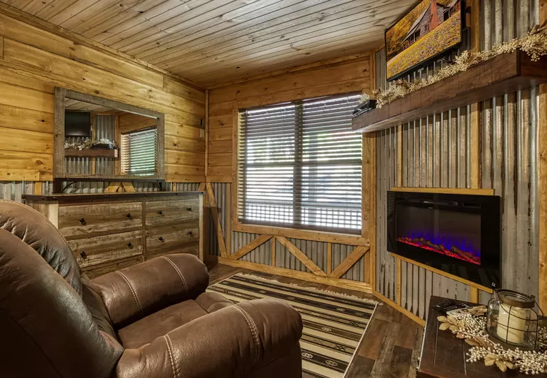 Honeymoon Hideaway bedroom with electric fireplace