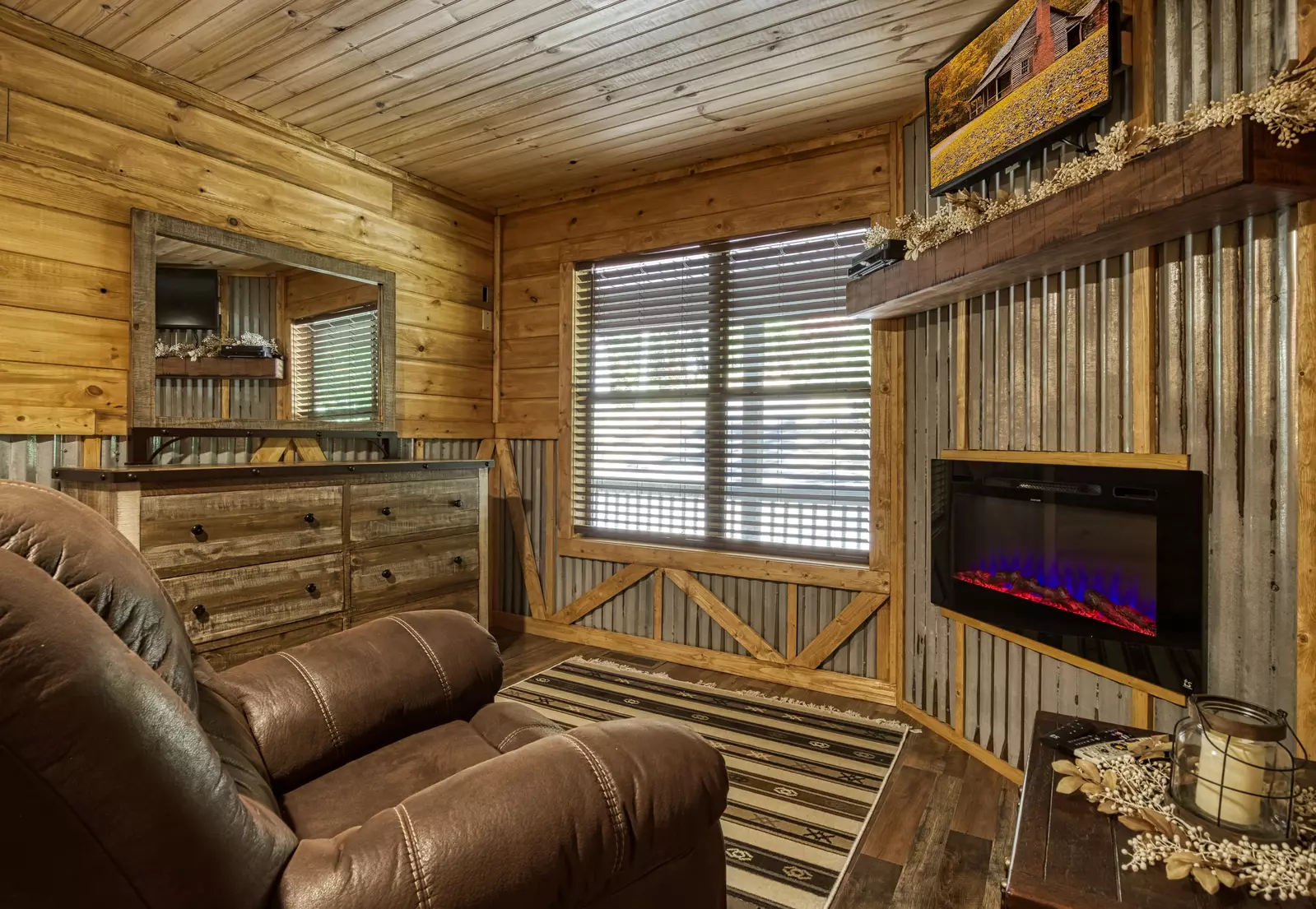Honeymoon Hideaway bedroom with electric fireplace