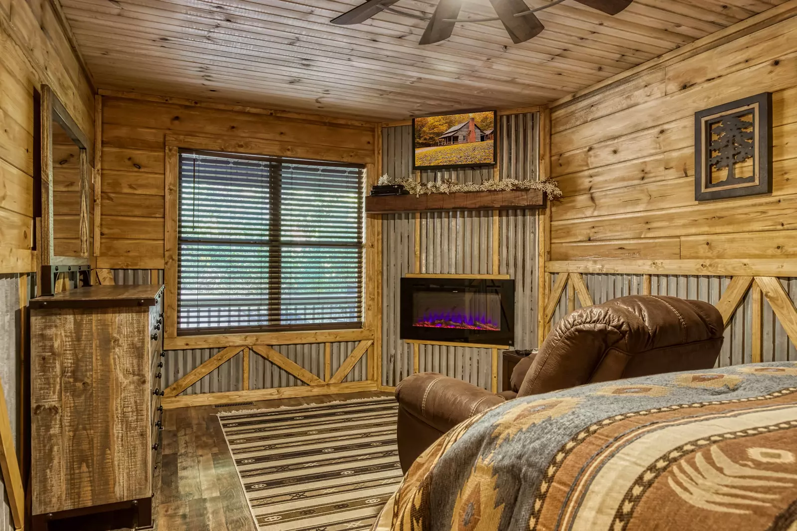 Honeymoon Hideaway bedroom with electric fireplace
