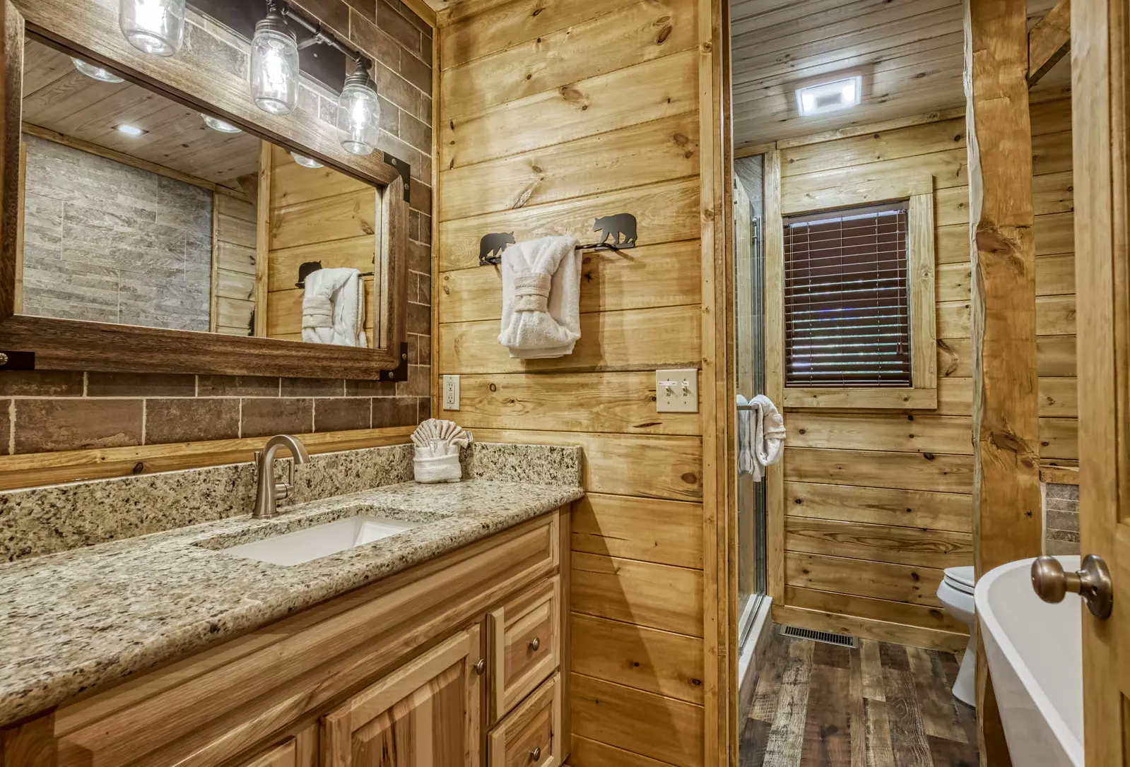 Honeymoon Hideaway bathroom with granite countertop