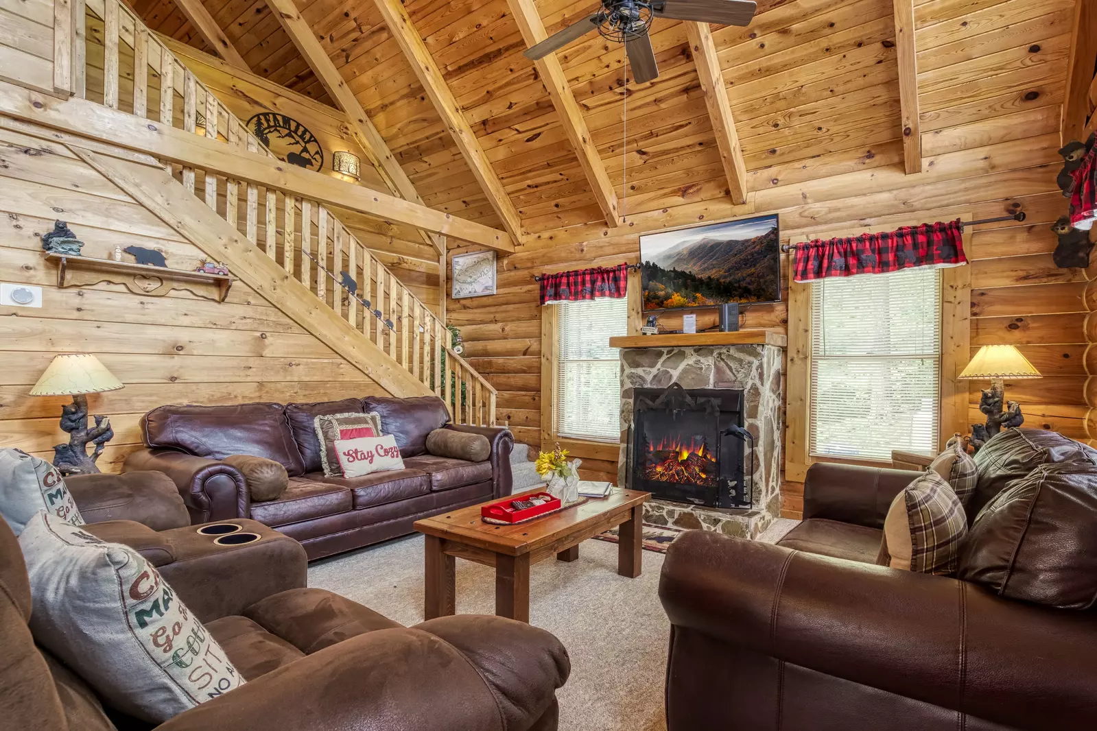 Honey Dreams living room with stone encased gas fireplace