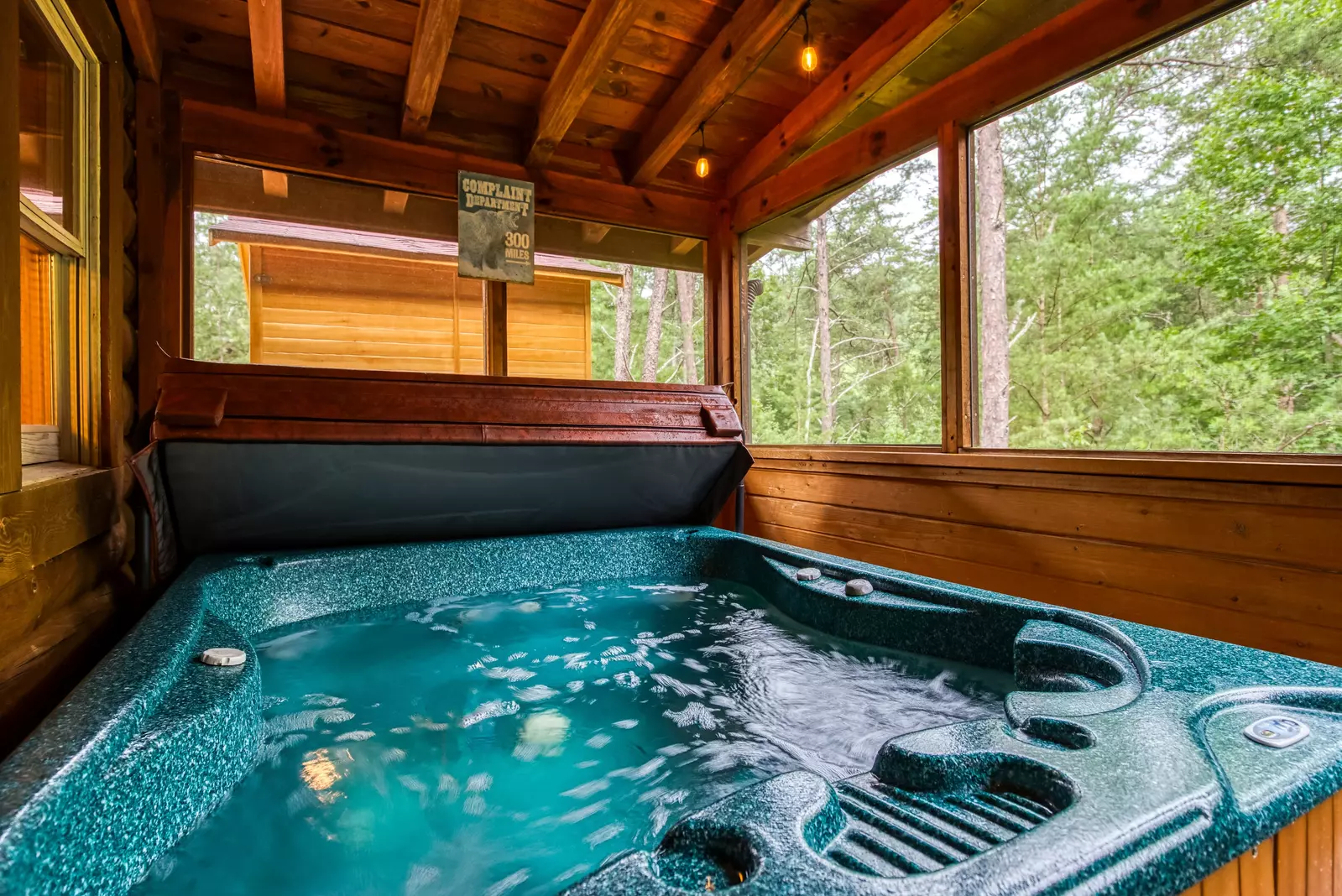 Honey Dreams screened in back deck with hot tub