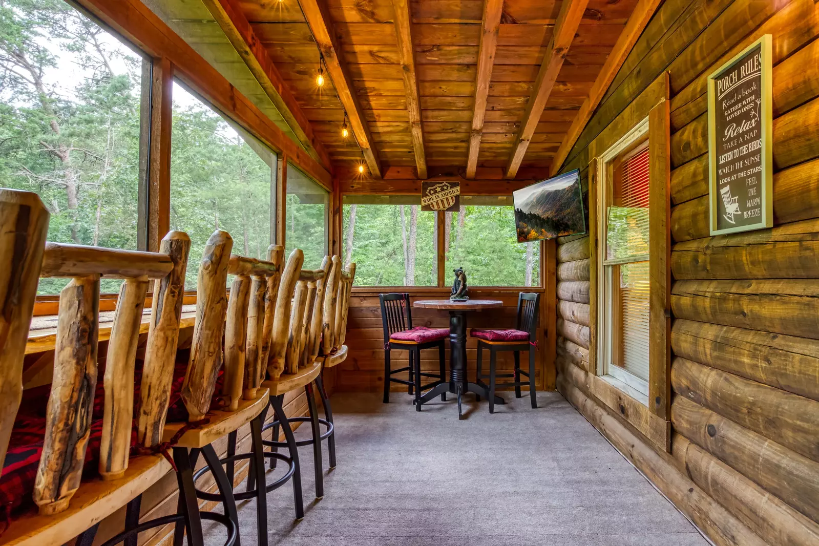 Honey Dreams screened in back deck with bar top and TV