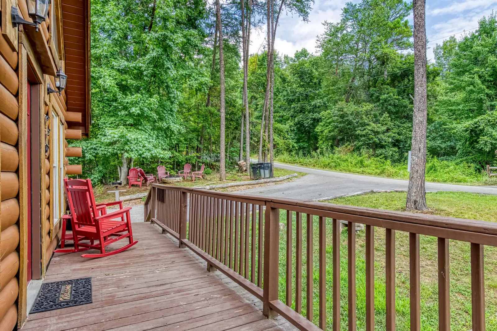 Honey Dreams entry deck with rocking chairs