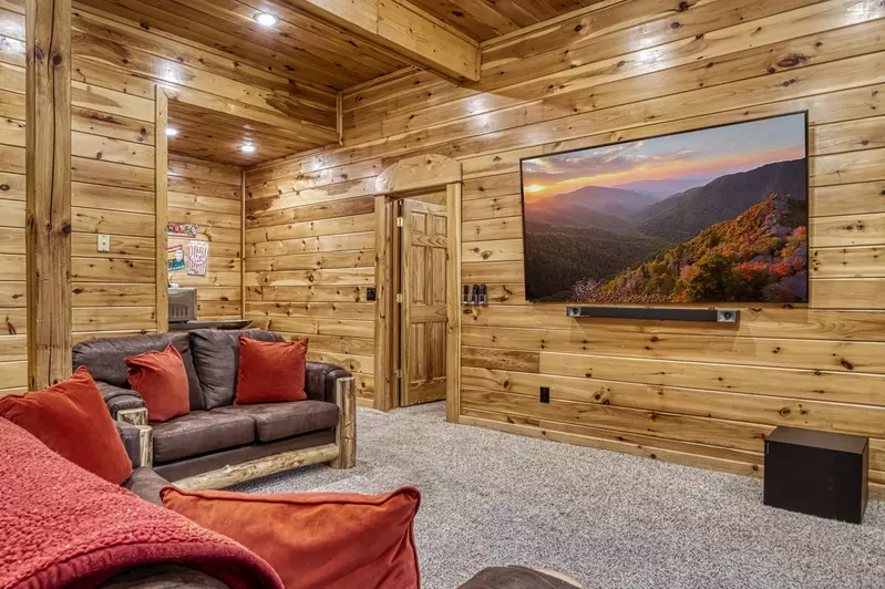 Katies Lodge lower level game room with 85 inch TV