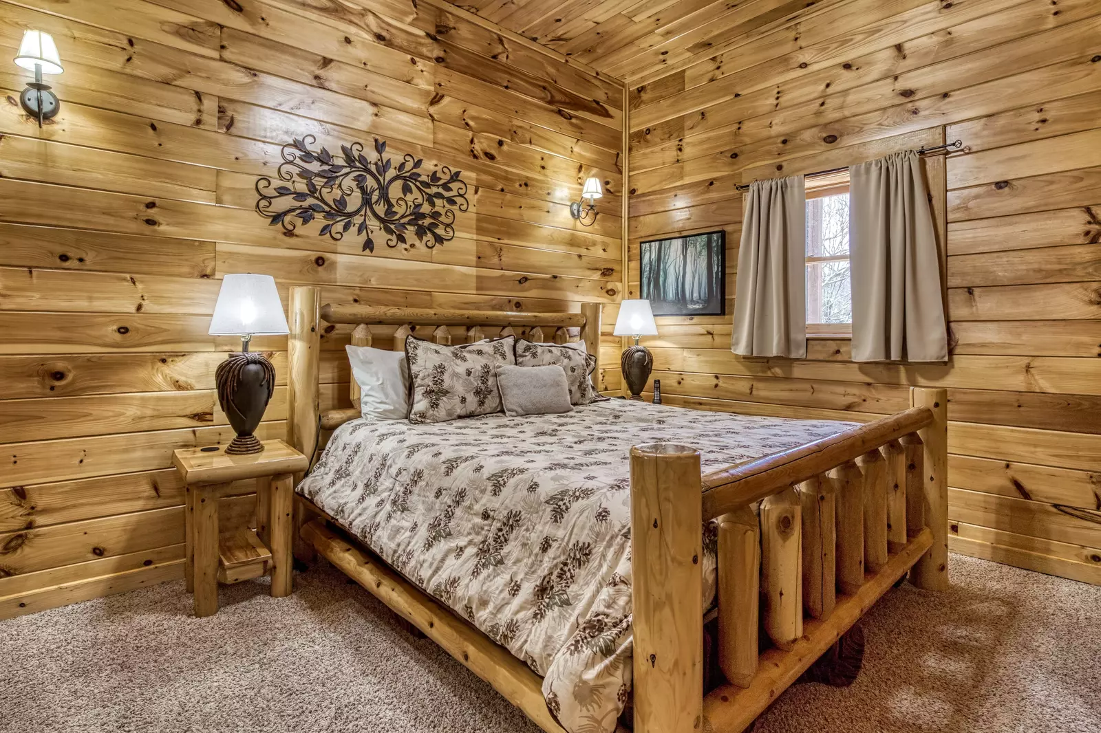 Katies Lodge lower level game room with king size bed