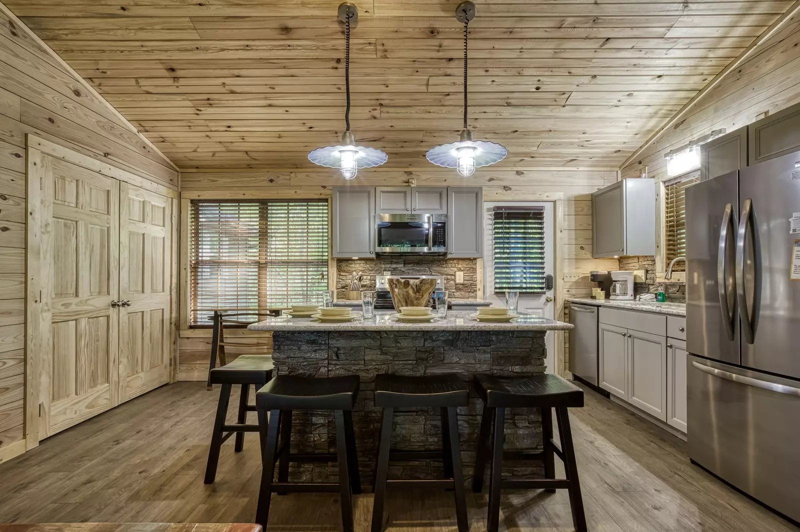 Little Piece of Heaven - Kitchen island and fully furnished kitchen with stainless steel appliances