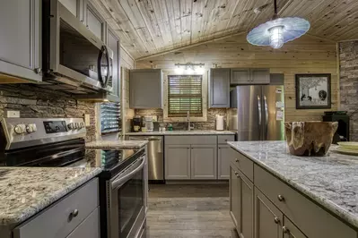 Little Piece of Heaven - Fully furnished kitchen with stainless steel appliances and granite countertops