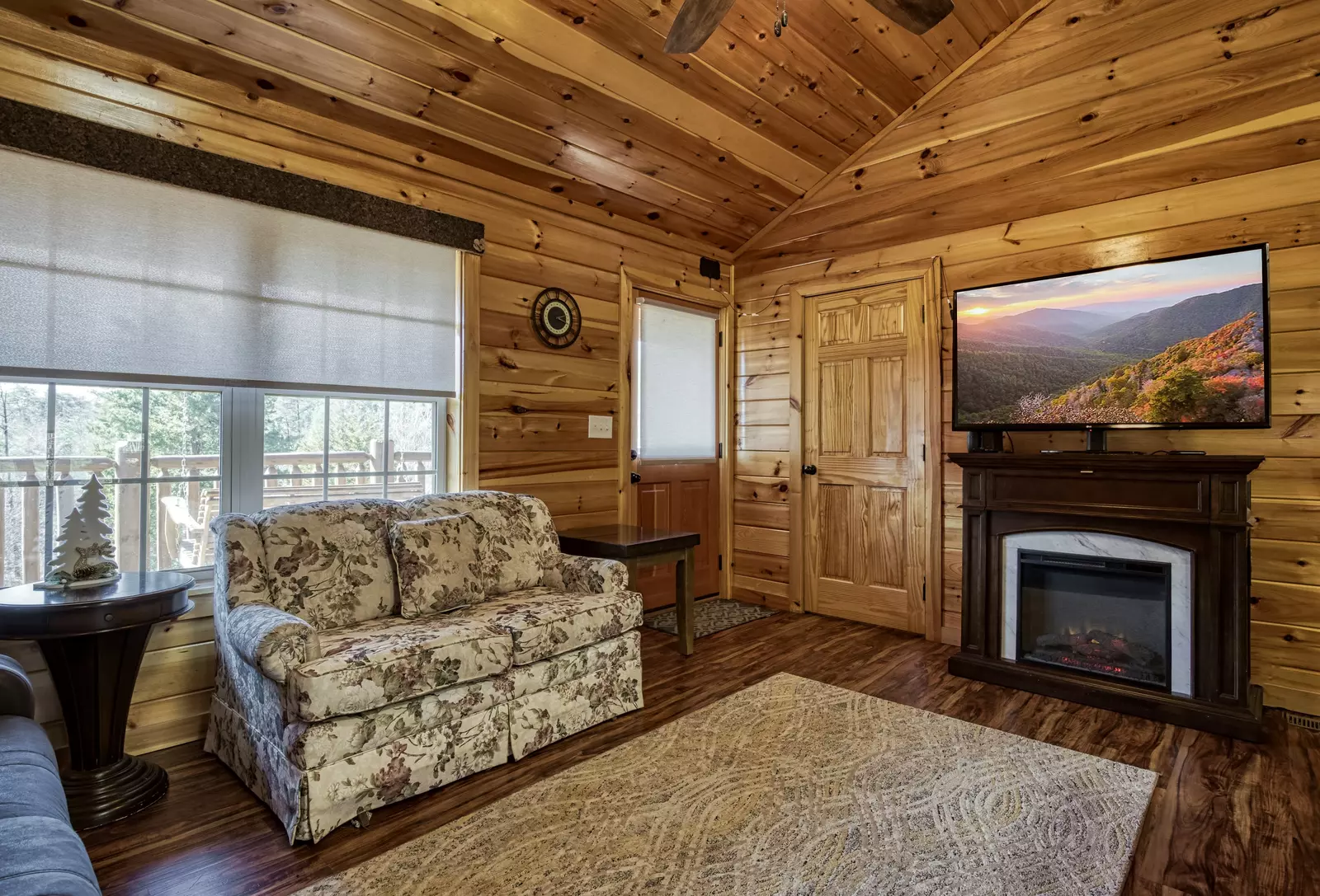 Magic Views living room with year round electric fireplace
