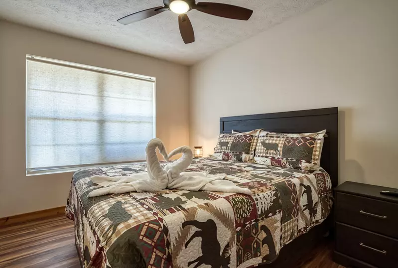 Magic Views main level bedroom with queen size bed