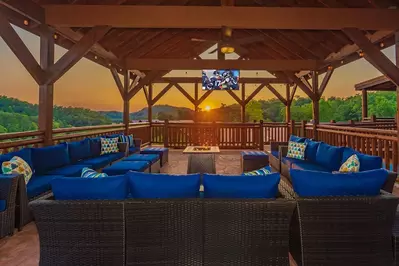 deck of a Smoky Mountain cabin at sunset