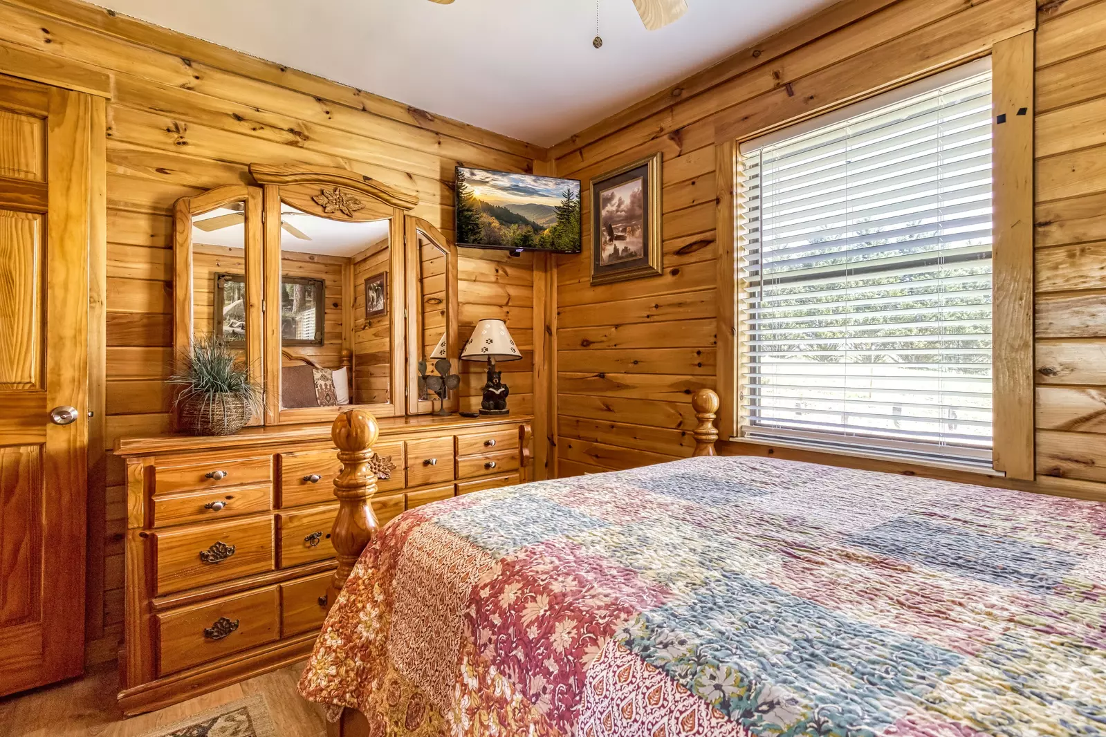 Happy Hollow Hideaway main level bedroom two with queen size bed