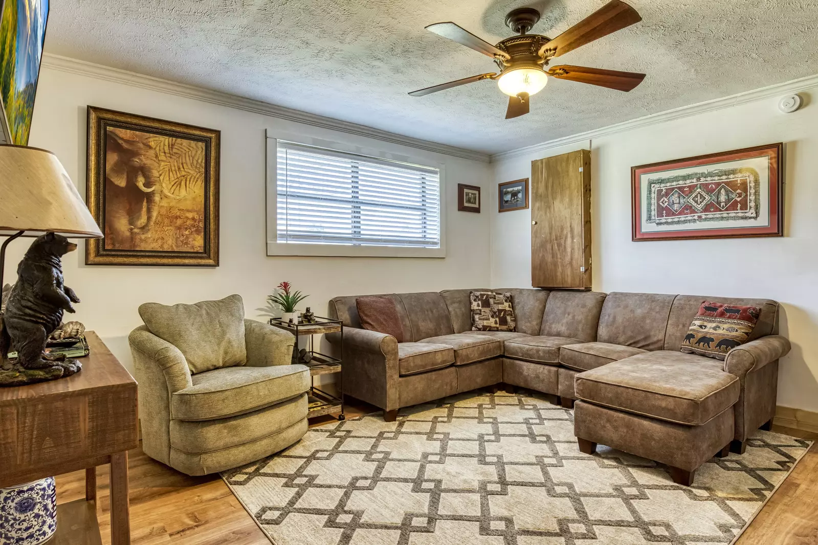 Happy Hollow Hideaway lower level living room with sectional recliner
