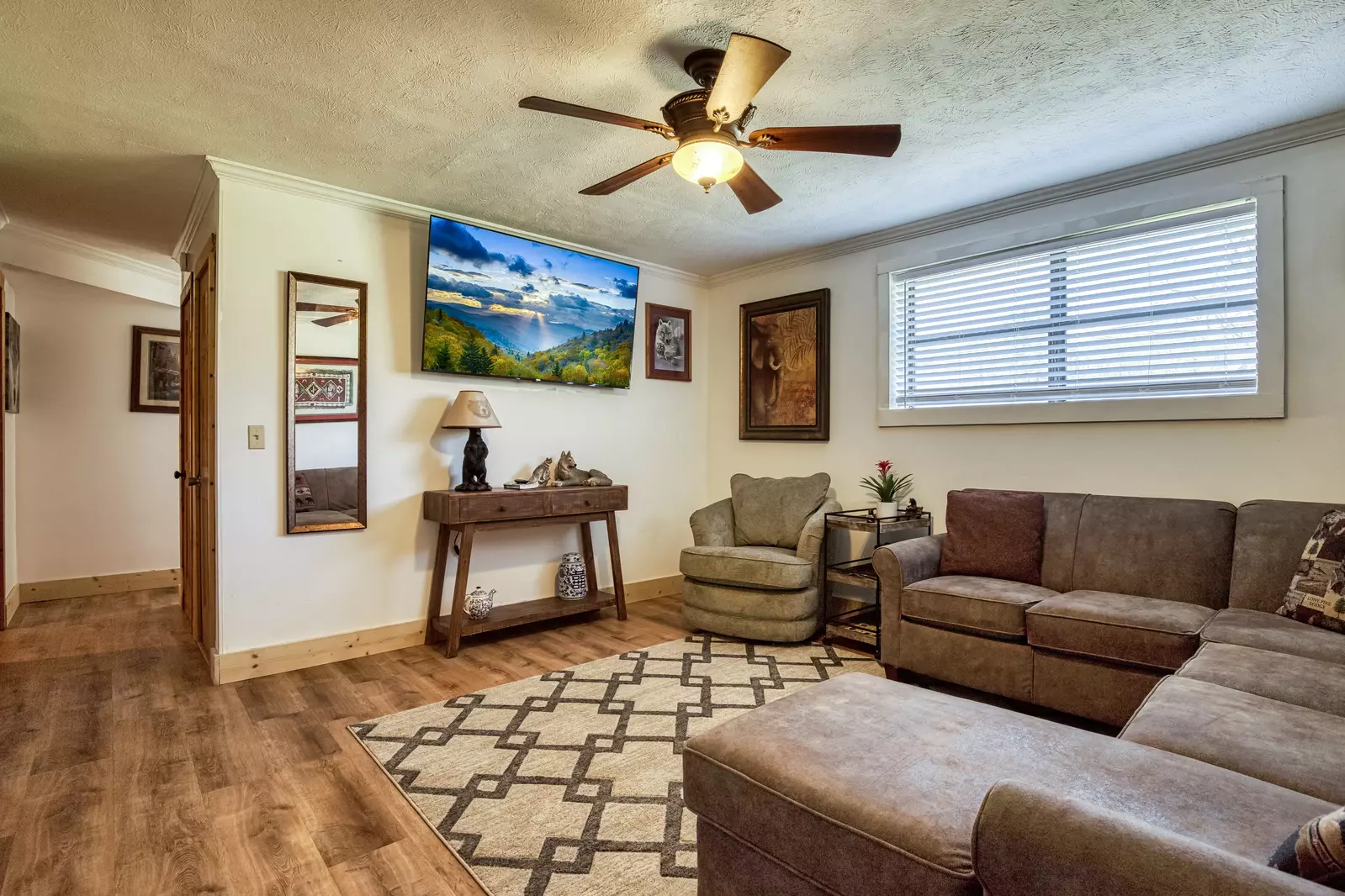 Happy Hollow Hideaway lower level living room with 65 inch TV