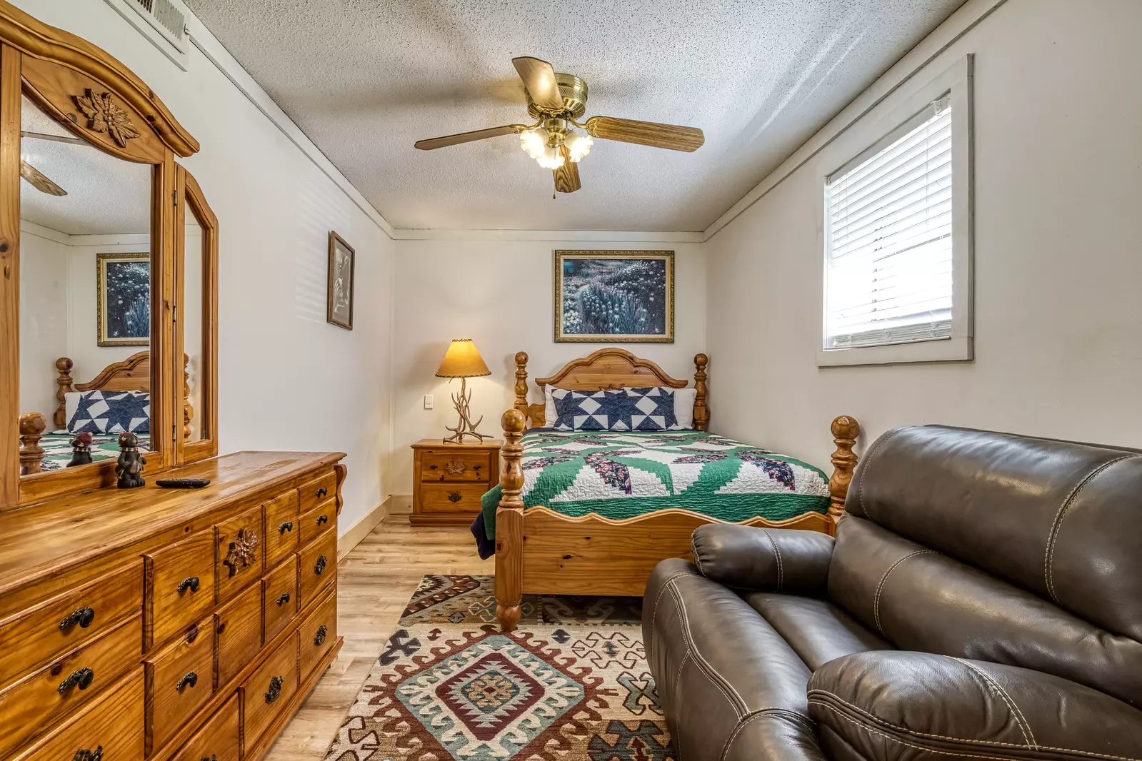 Happy Hollow Hideaway lower level bedroom with queen size bed