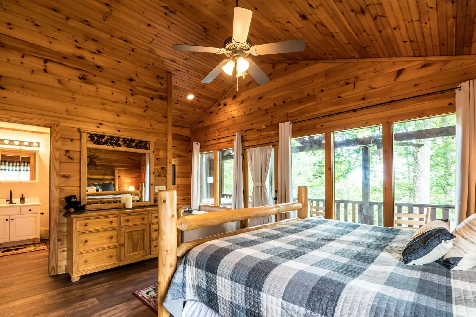 Large picture windows with an abundance of natural light & with a view
