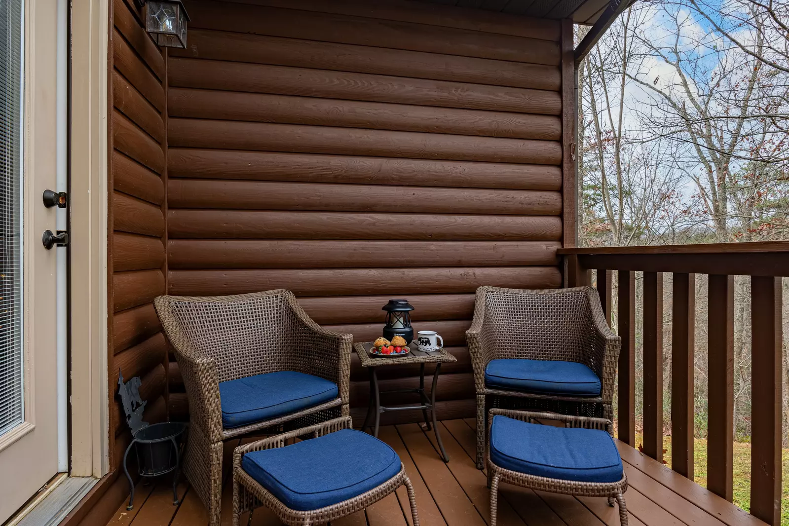 fenced patio with hot tub